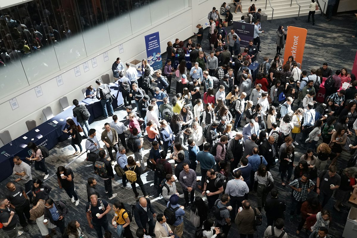 Delegates on a busy exhibition floor